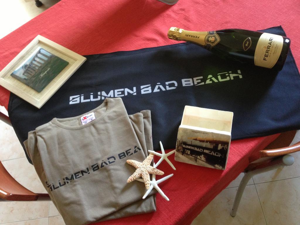 Blumen Bad Beach Apartment Metaponto Bagian luar foto